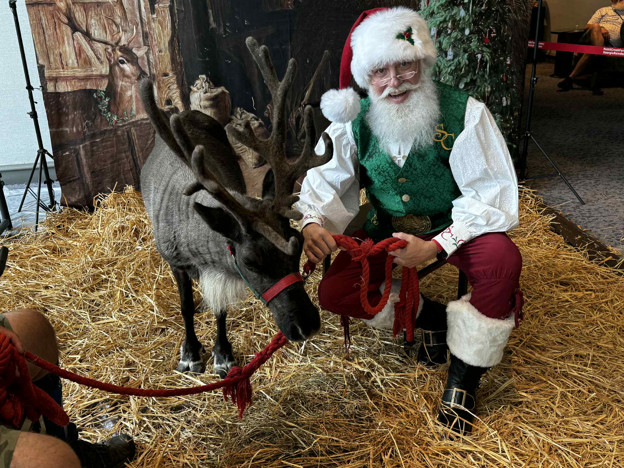 Santa at a hot cocoa station